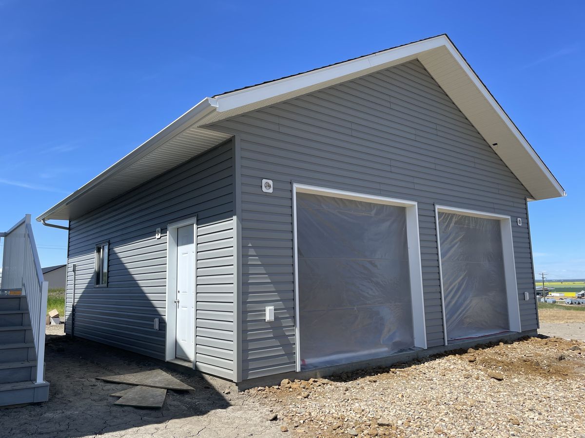 Eavestrough and downspout system on a residential property in northern BC