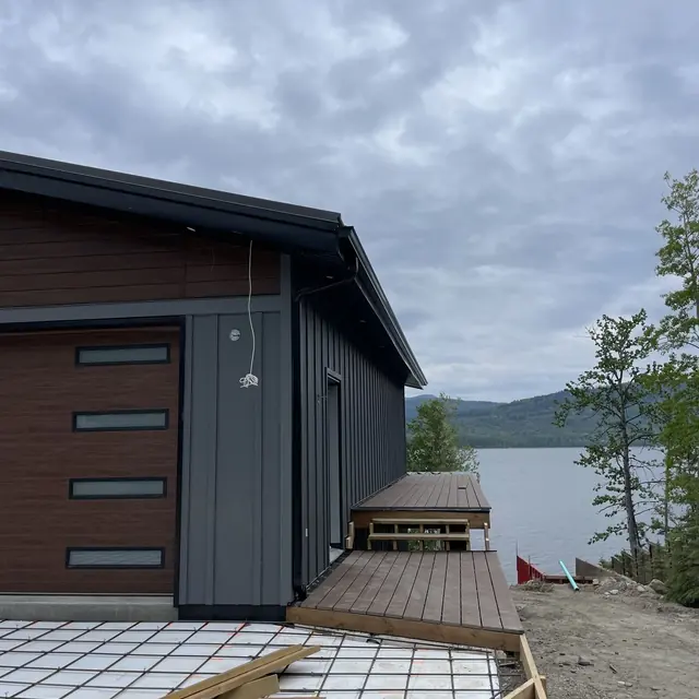 Gutter system installation on a property in the Peace Region of BC